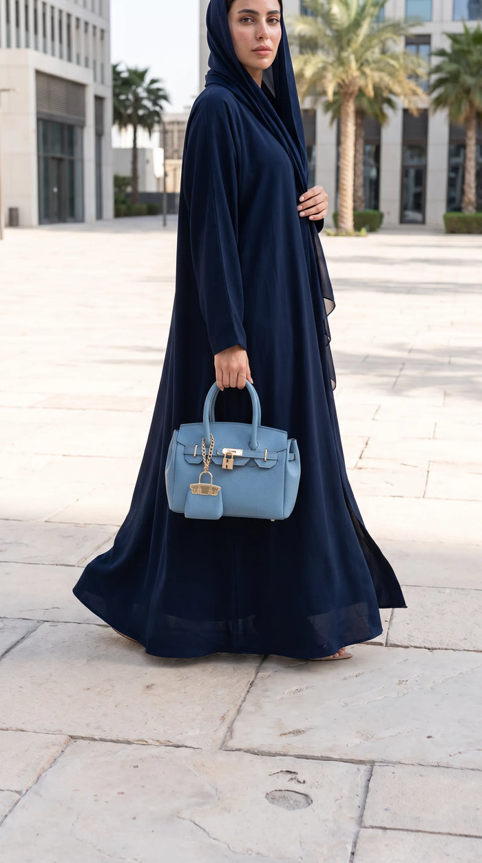 Azure Lola bag carried by the handles